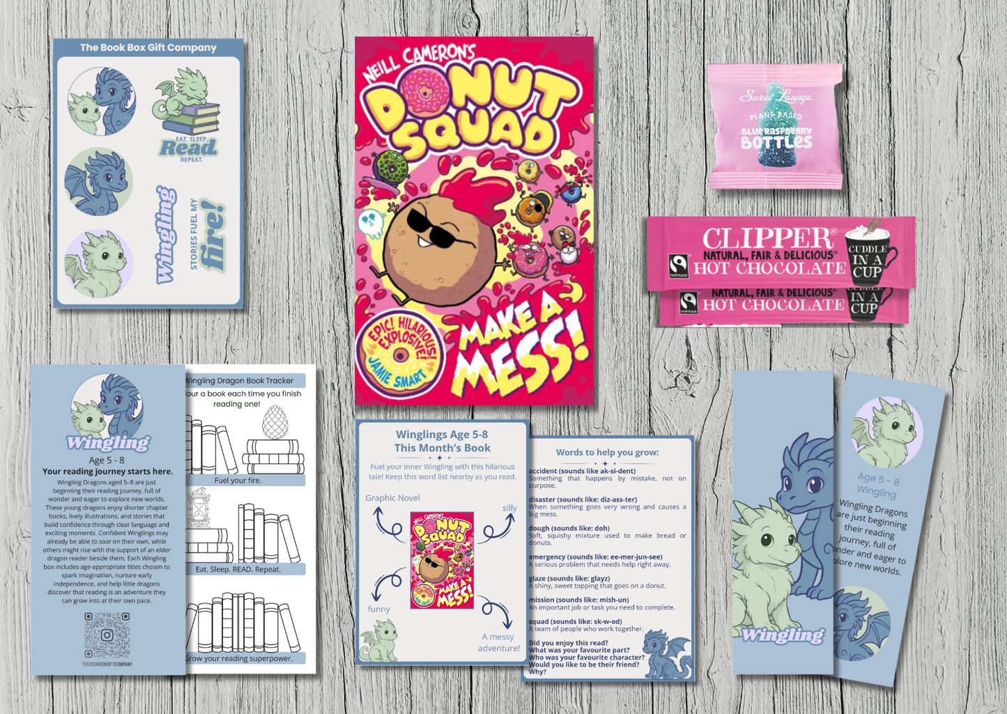 Children's monthly book subscription gift, with sweets, bookmark and  stickers.